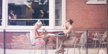 two friends eating lunch