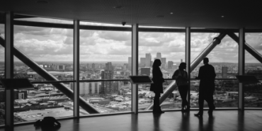 group of employees meeting city