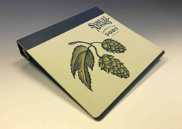 Sam Adams chipboard binder debossed logo