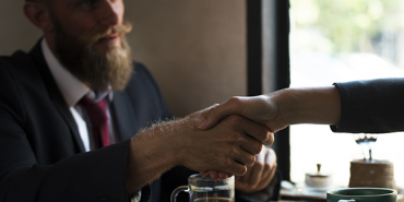 two businessmen shaking hands