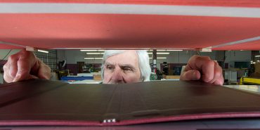 trendex employee putting in tablet case